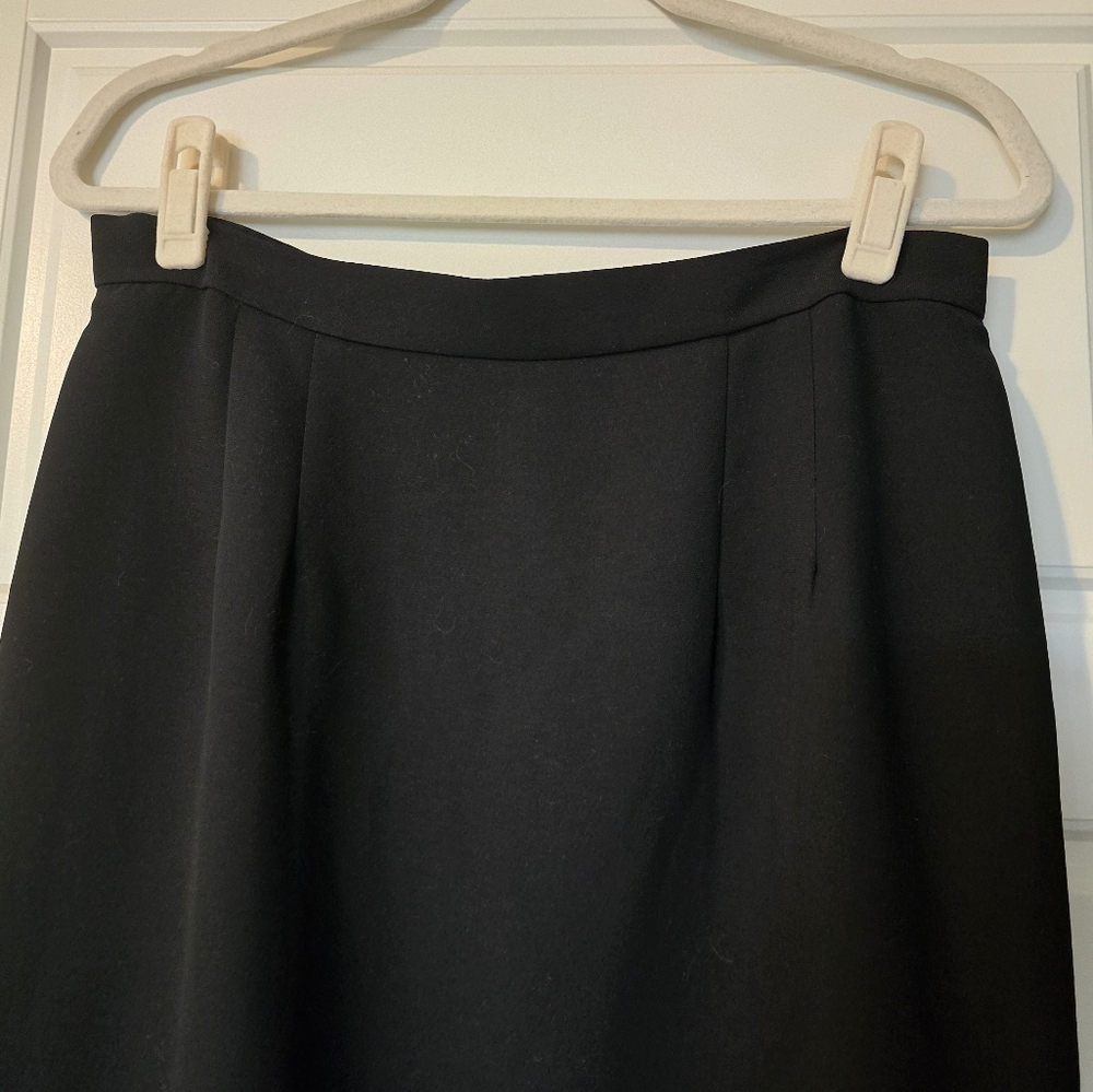 Black midi skirt with red slit